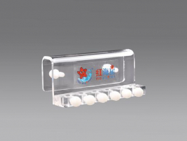 Acrylic dosing tube clamp